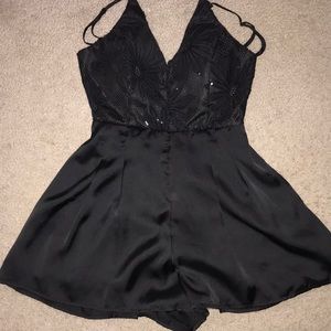 Open back black romper